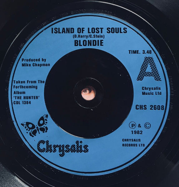 Blondie, "Island Of Lost Souls" Single (1982). Record sticker label, blue injection, image. Pop-punk, power pop. Punk.