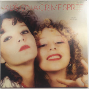 Kids On A Crime Spree, "We Love You So Bad" LP (2011). Front cover image. Mario Hernandez and Becky Barron new project, KOACS! Slumberland Records fuzzy garage pop!